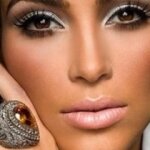 Kim Kardashian strips for W